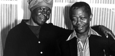Old black and white picture showing two Notting Hill housing tenants.